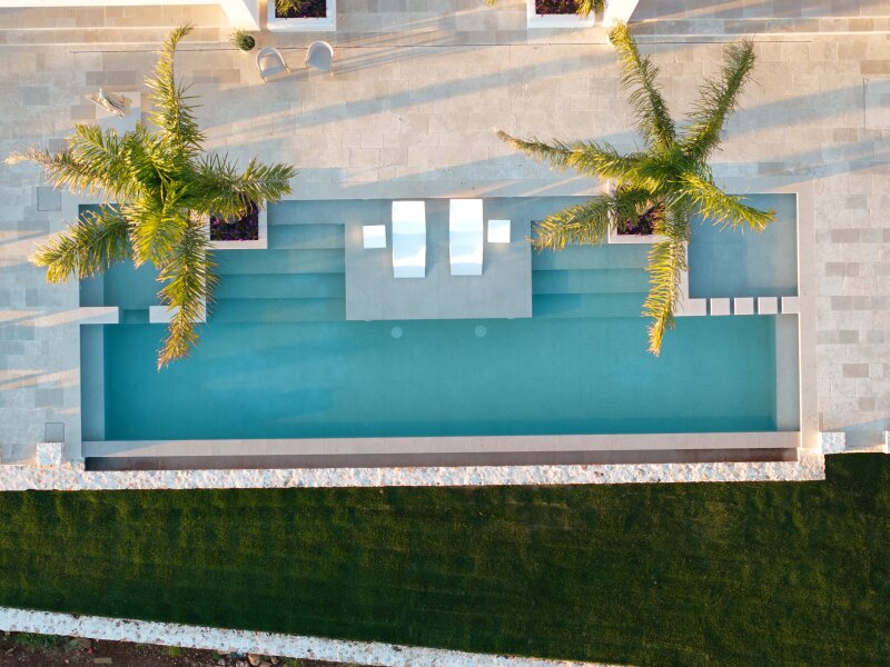 Swimming pool drone shot.